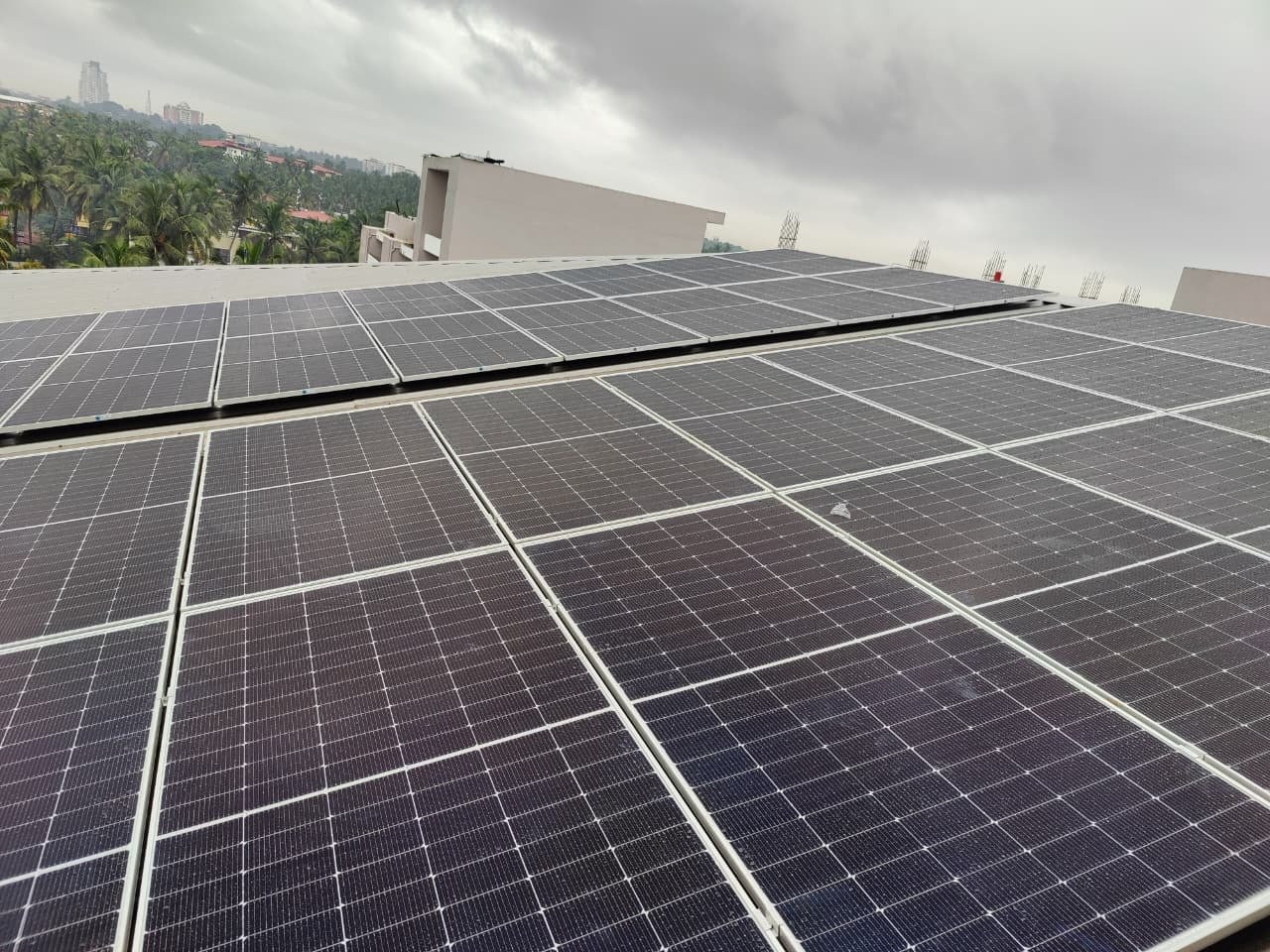 Engineer configuring and testing solar inverters.